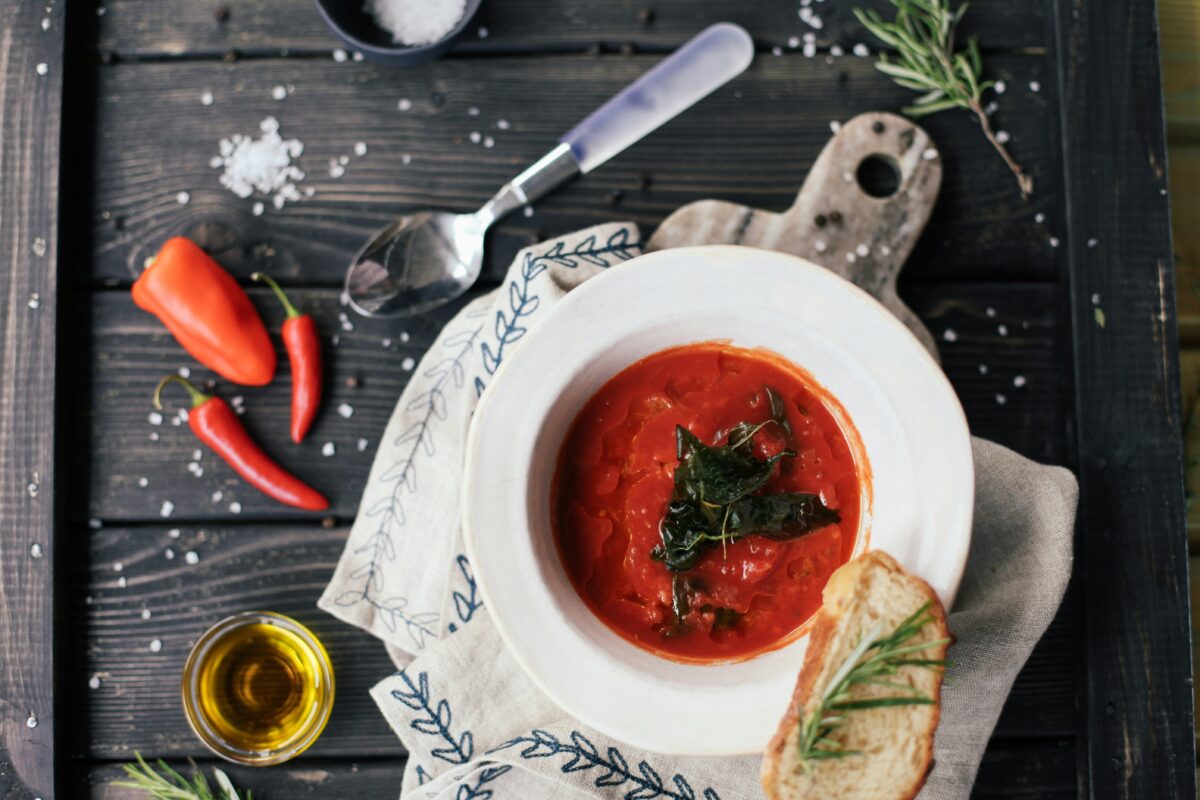 Gazpacho on a wood table.