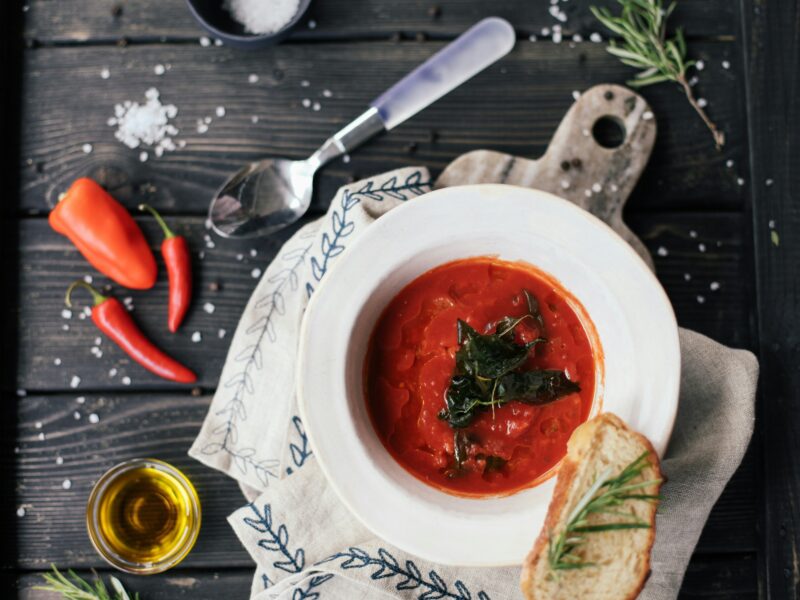 Gazpacho on a wood table.