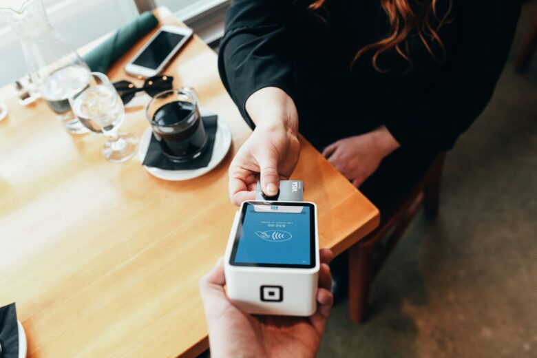 Paying a restaurant bill.