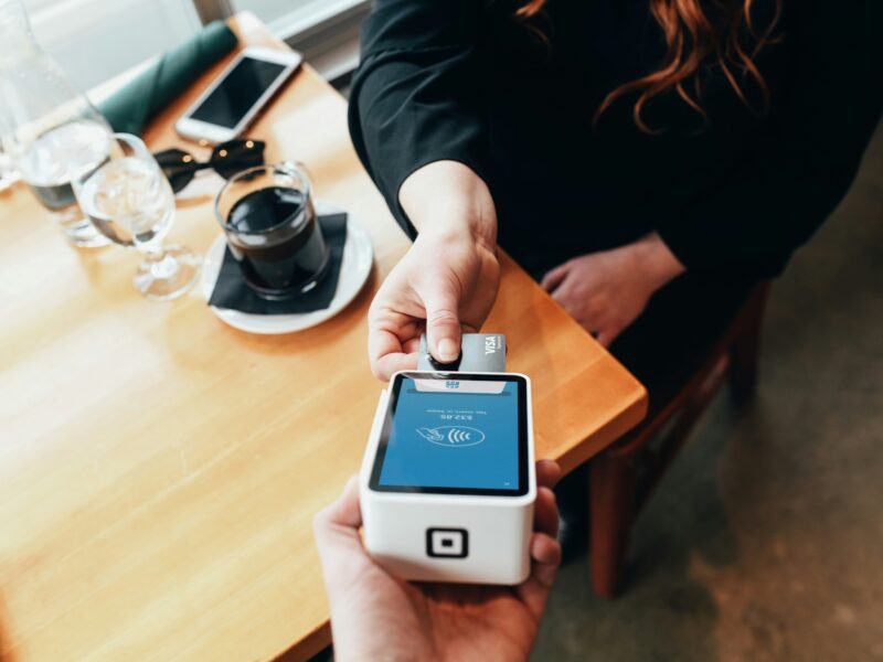 Paying a restaurant bill.