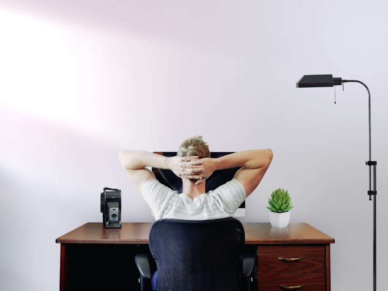 Person relaxing at desk