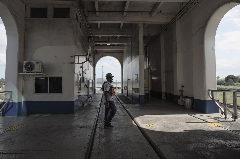 A canal worker stands at the control center of the Miraflores locks on the Panama Canal near Panama City in Panama