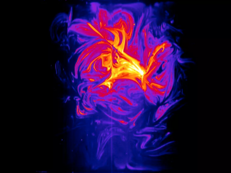 A fluorescent purple and yellow swirl, in the style of a technical mapping such as through infrared