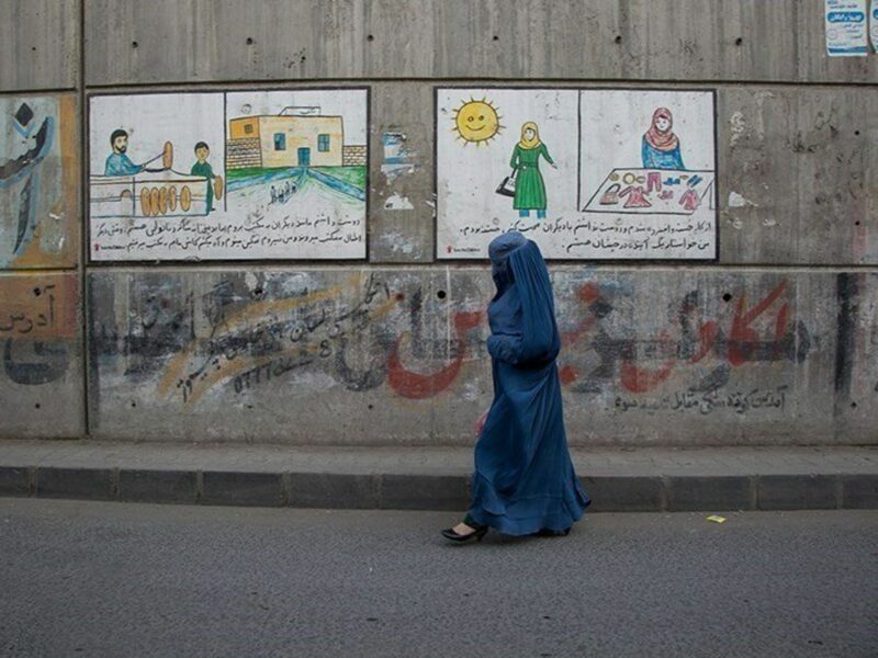 Afghan woman walking