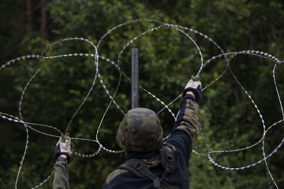 Border fence construction in Zubrzyca Wielka, Poland