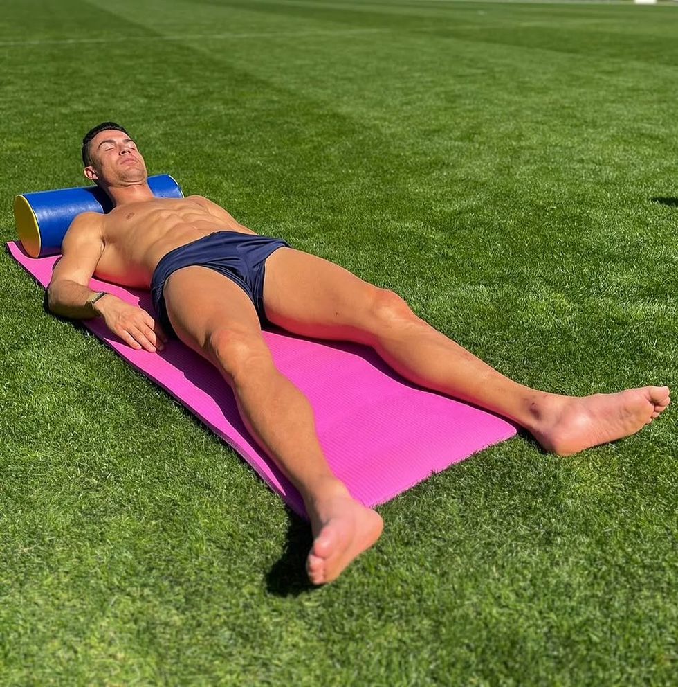Cristiano Ronaldo resting in the sunlight after training