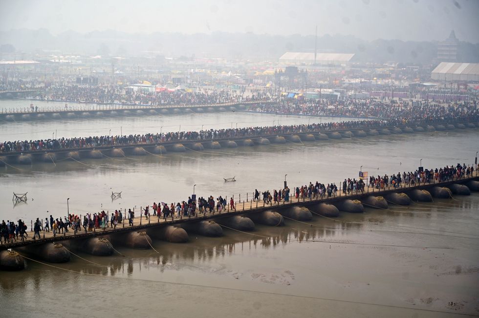 Devotees arrive at Sangam on the first day of Maha Kumbh Mela 2025
