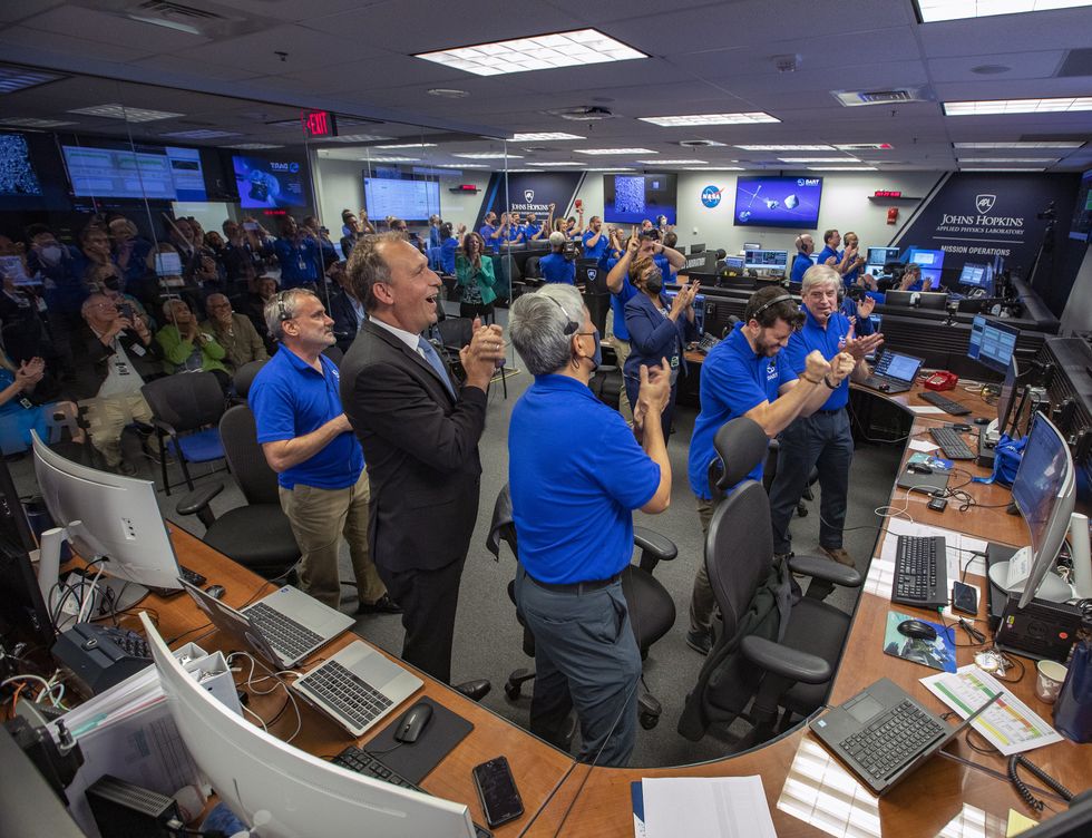 NASA's Double Asteroid Redirection Test (DART) command team at Johns Hopkins University, Applied Physics Laboratory monitoring the DART spacecrafts impact into the asteroid Dimorphos.