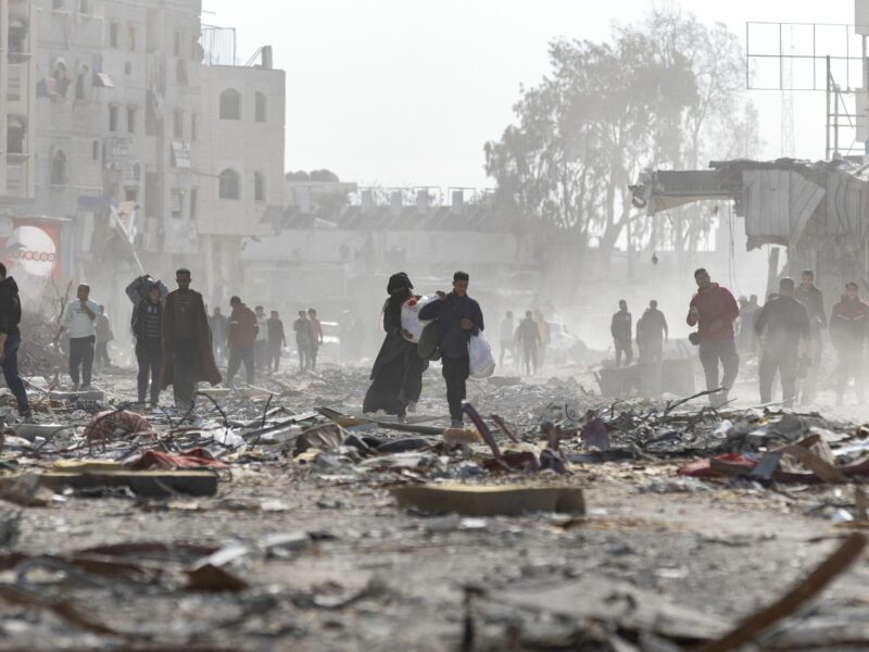 Palestinian citizens inspect their destroyed homes in the city of Rafah, south of the Gaza Strip, after the ceasefire came into effect
