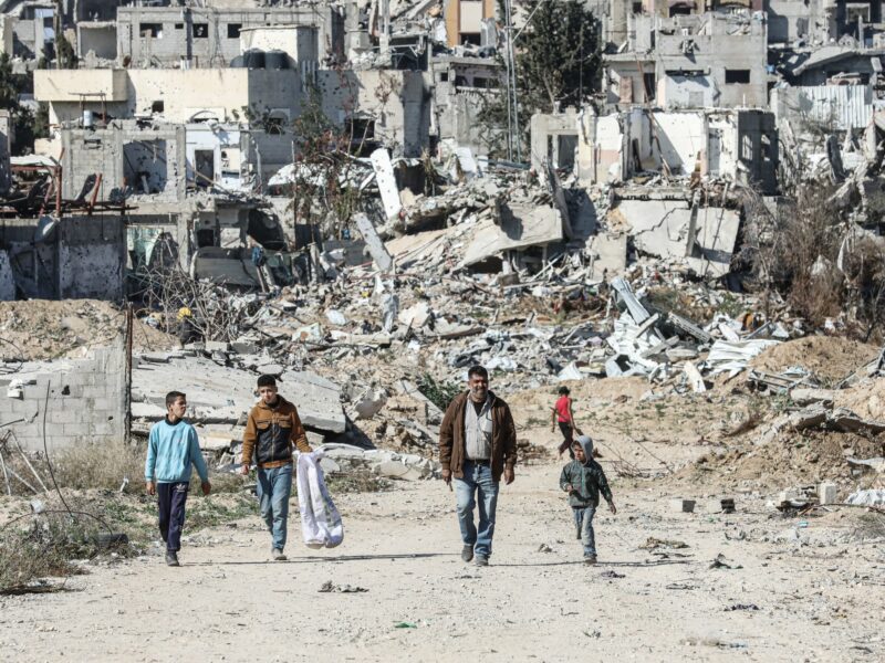 Palestinian Territory: Displaced Palestinians continue to return their houses past heavily damaged and partially collapsed buildings after the ceasefire and hostage-prisoner swap deal between Hamas and Israel at Bureij refugee camp in Deir al-Balah