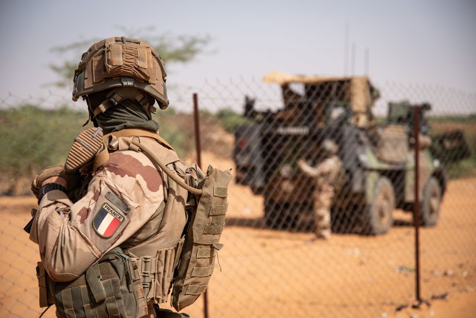 Photo of a French soldier looking away from the camera in Gossi, Mali