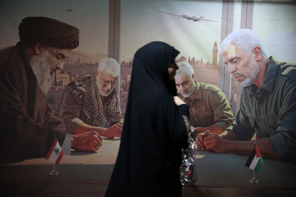 Photo of a picture of the Axis of Resistance leaders during a ceremony commemorating the anniversary of Major General Qasem Soleimani's death in 2020.