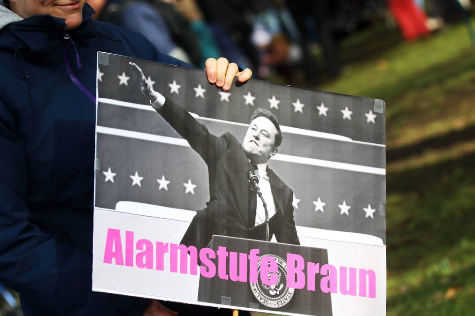 Photo of a protester holding a sign with an anti-Musk message as part of a demonstration in Göttingen, central Germany, on Feb. 1