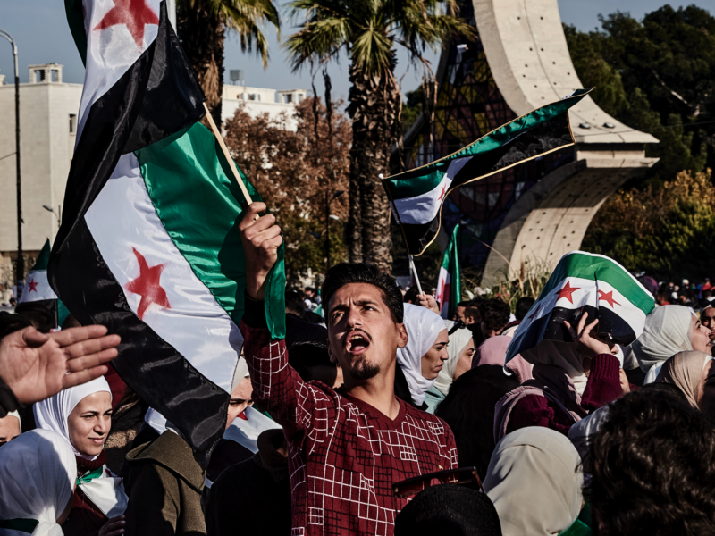Photo of people celebrating the fall of Bashar al-Assad in Damascus on Dec. 15