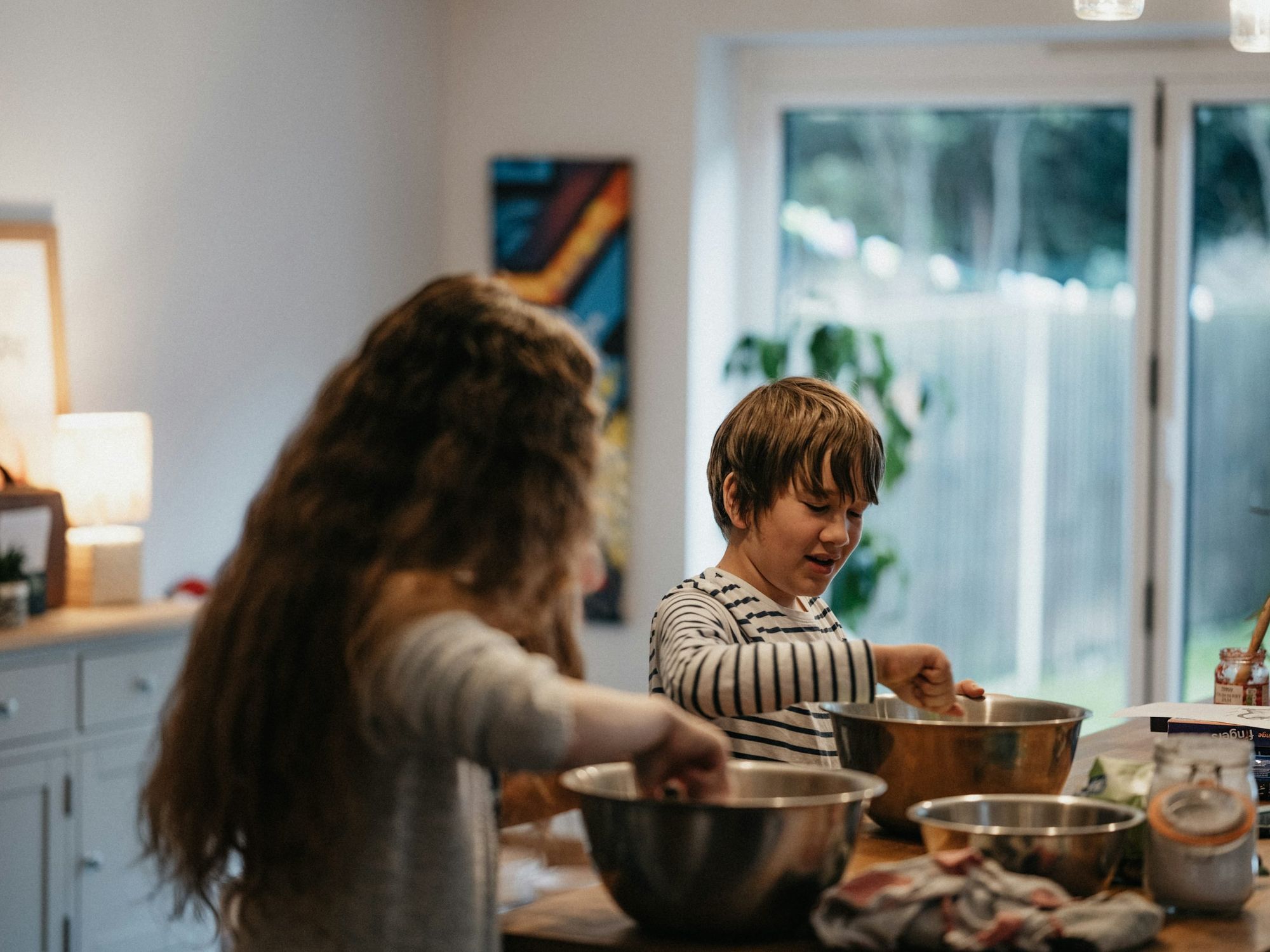 Photo of two kids cooking