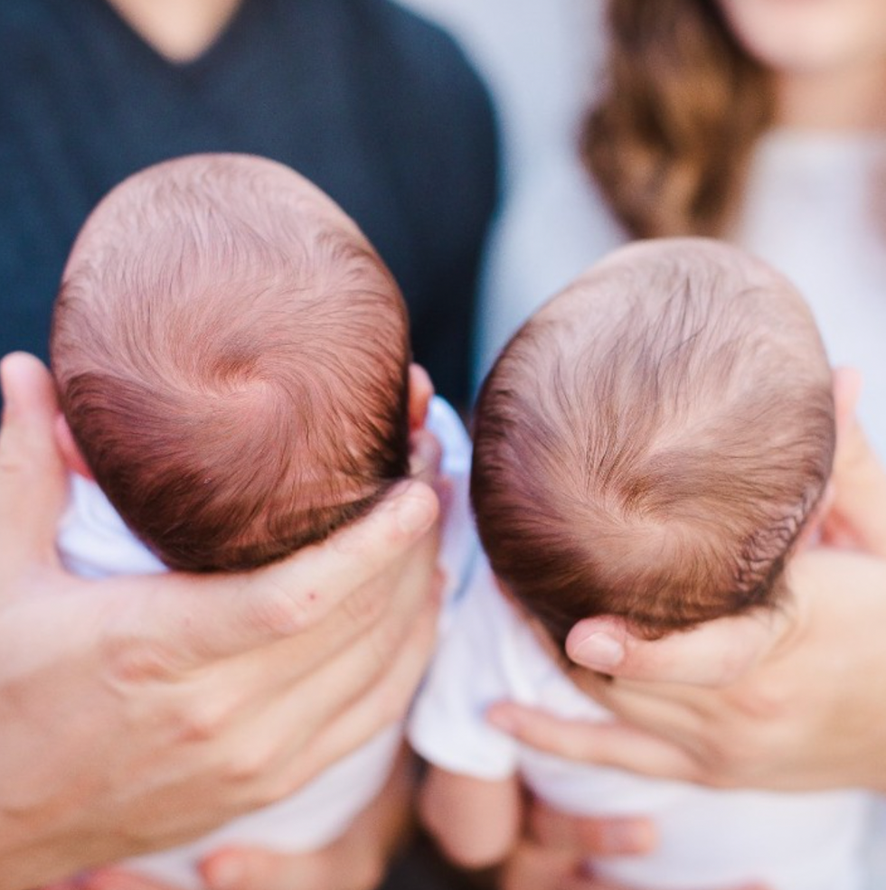 Photo of two newborn babies side by side