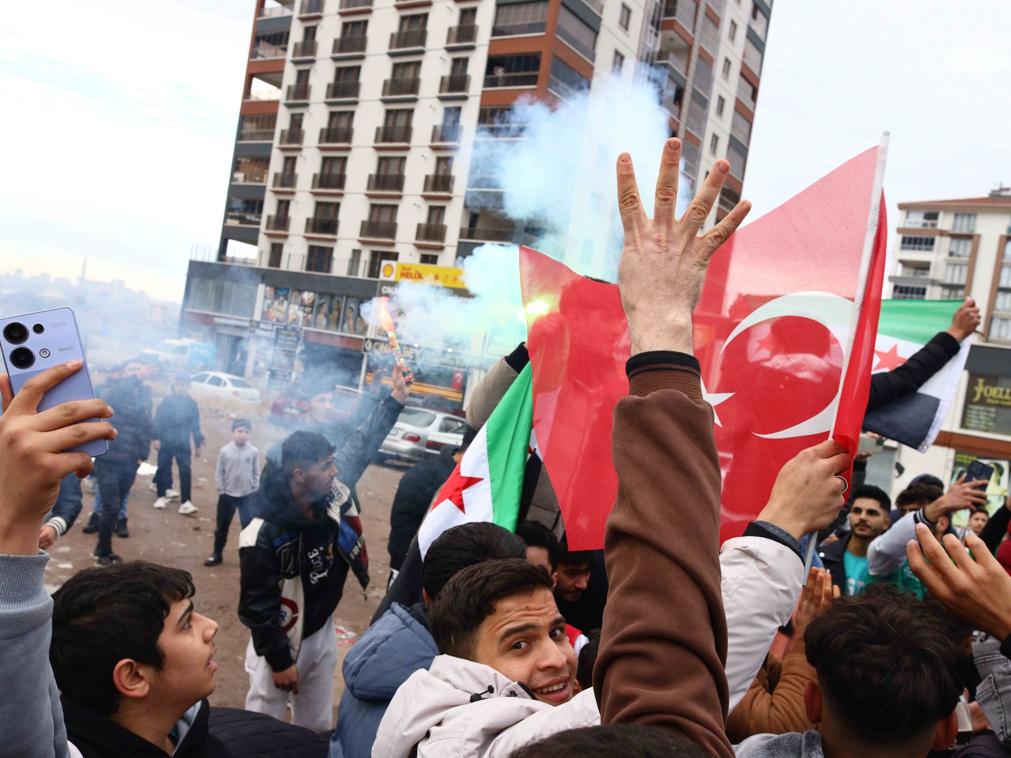 Syrian nationals who took shelter in Türkiye after fleeing the regime attacks in their country, celebrated on Sunday the apparent end of Assad as anti-regime forces captured Damascus