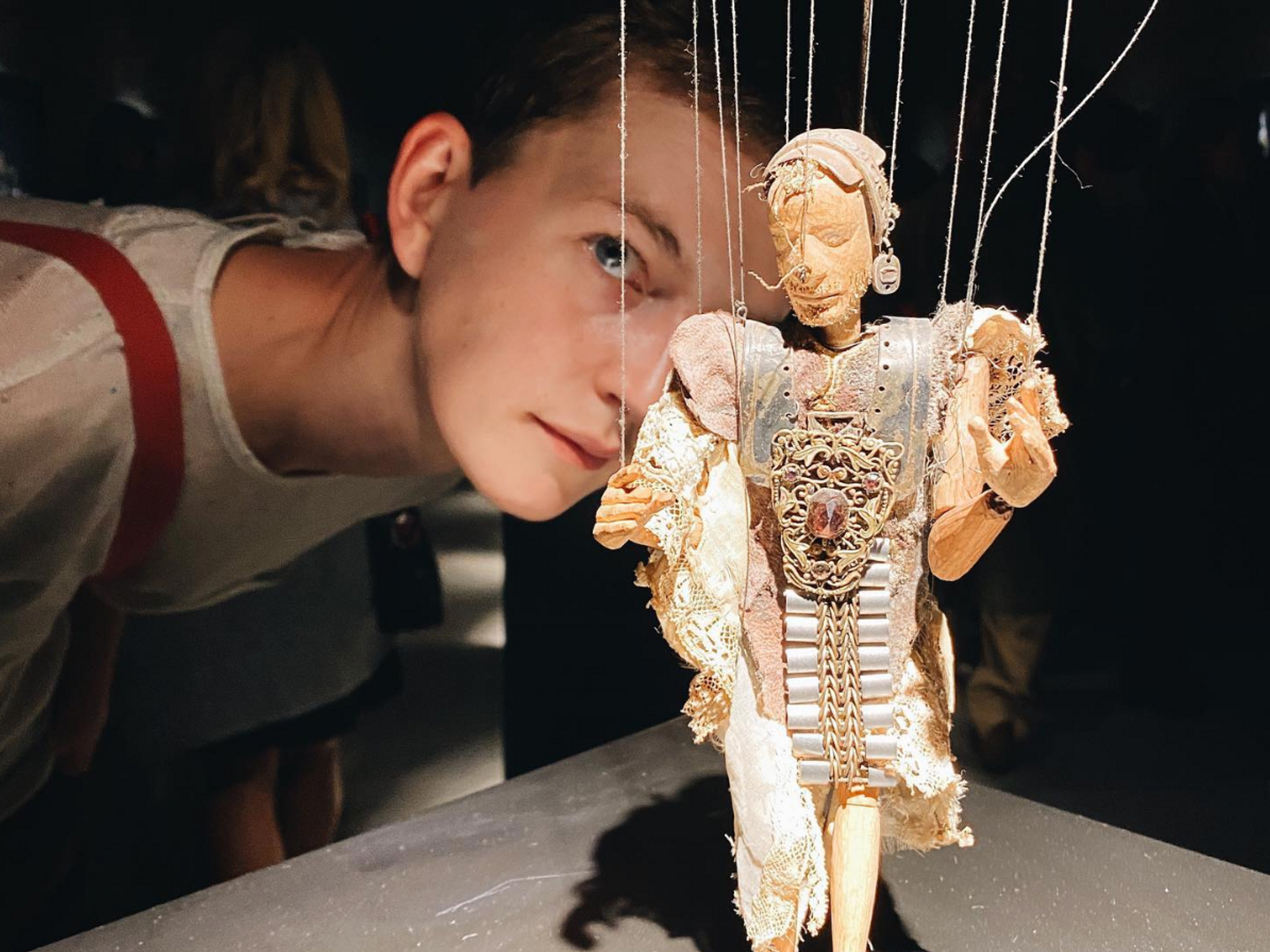 Woman looking at puppet