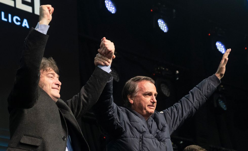 07 July 2024, Brazil, Camboriu: Argentinian President Javier Milei (l) cheers with Brazilian ex-President Jair Bolsonaro during the CPAC Brasil 2024 (Conservative Political Action Conference), a conservative event, in Balneario Camboriu, Santa Catarina state, Brazil. (Credit Image: © Lucas Vinicius Correia/dpa via ZUMA Press)