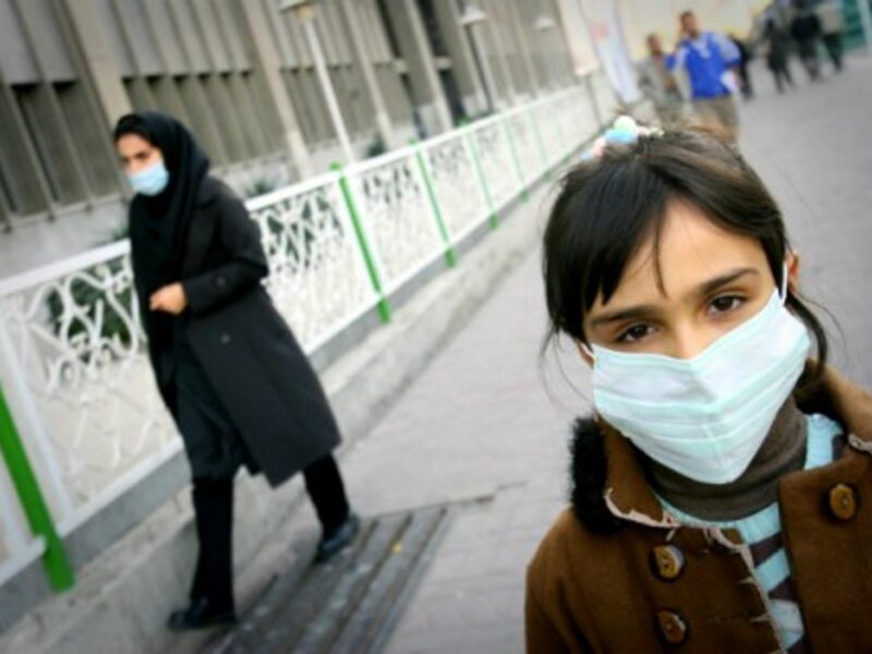2010 An Iranian girl wears a mask on a street in Teheran