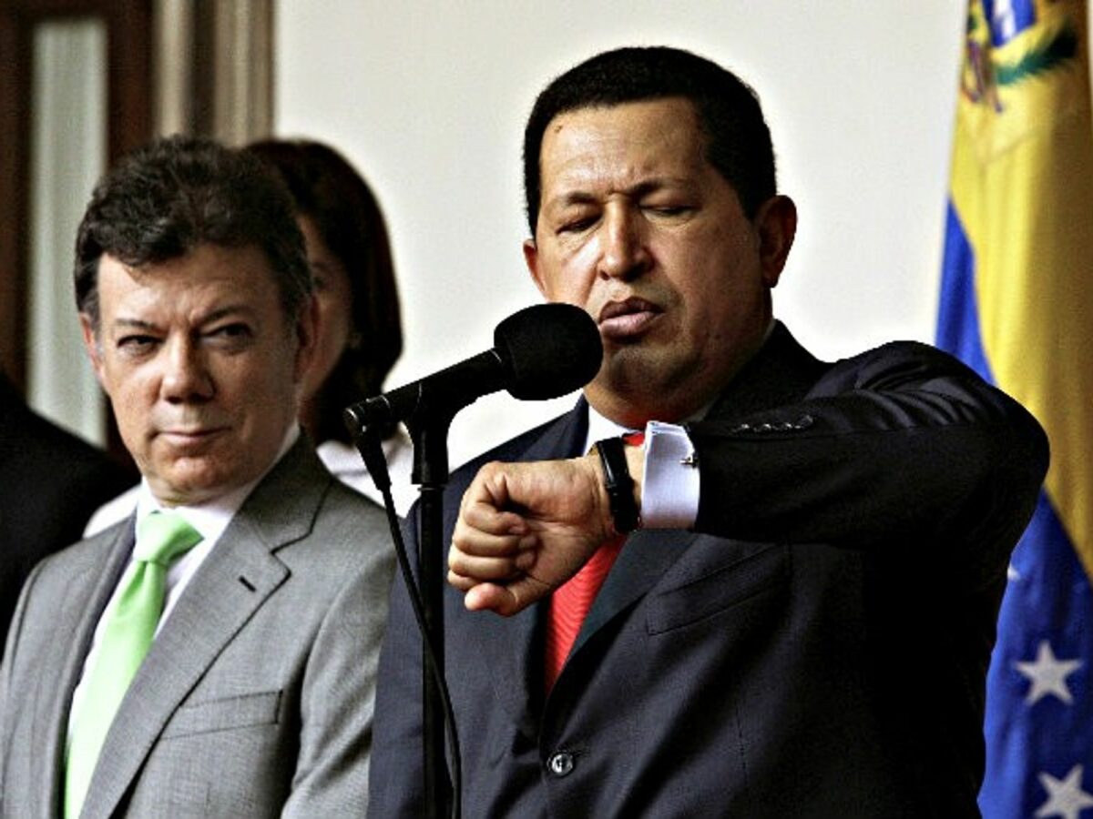A 2010 photo of Juan Manuel Santos and late Venezuelan President Hugo Chavez