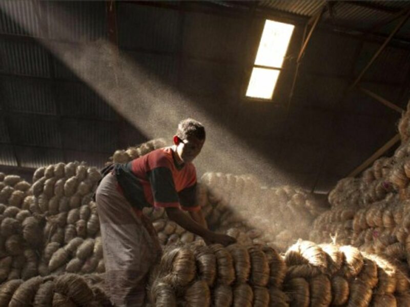 A Bangladeshi man is working inside a jute warehouse on the outskirts of the country's capital Dhaka.