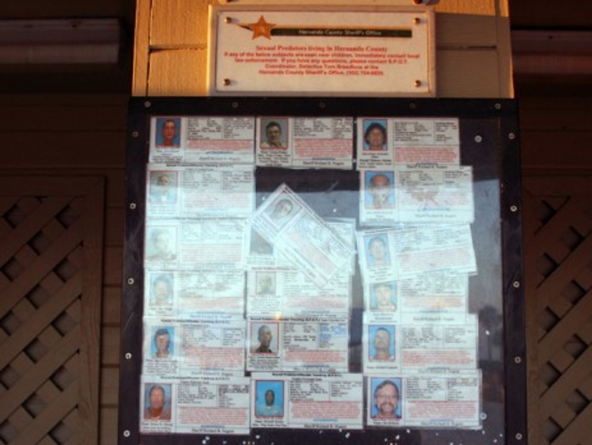 A bulletin board with sexual predator notifications in Florida.