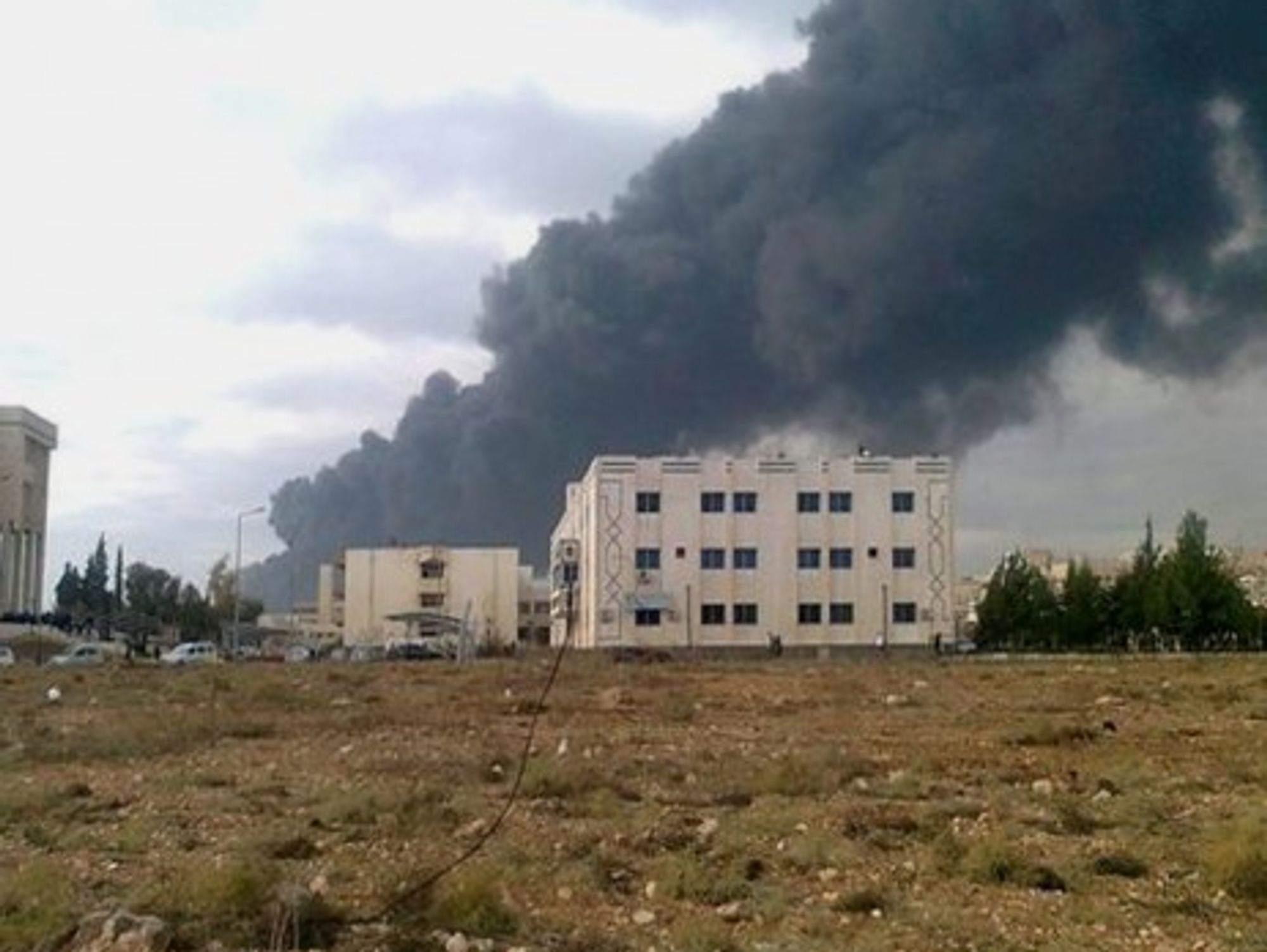 A burning building in Homs on Jan. 20, 2012 (FreedomHouse)