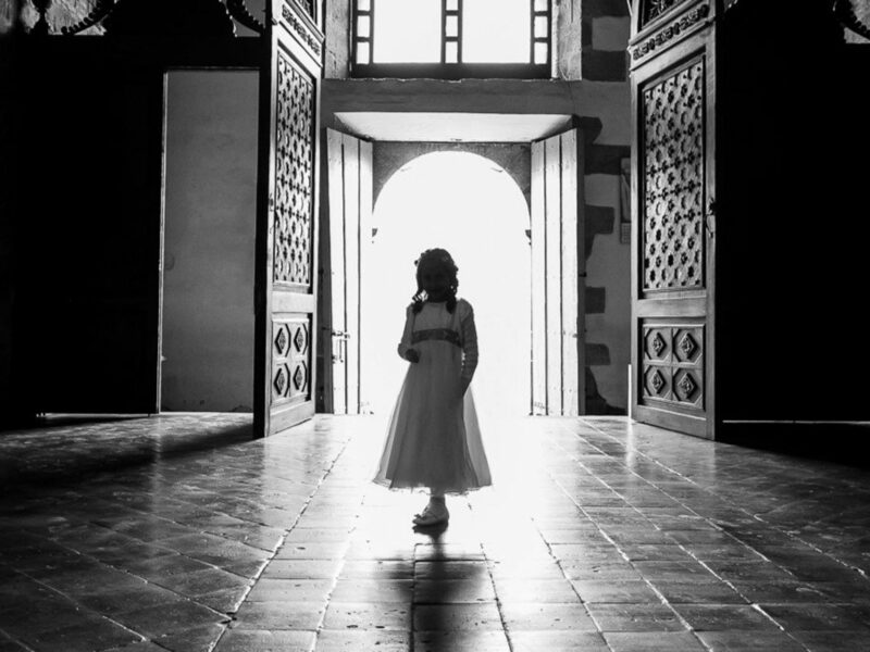 A child dressed for a wedding in Monguí, Boyaca, Colombia.