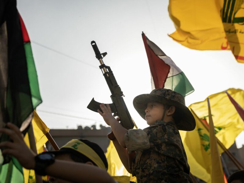 A child holds a toy gun in Beirut, Lebanon.​