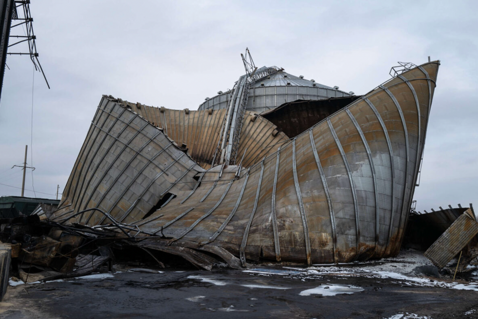 A collapsed corn silo.