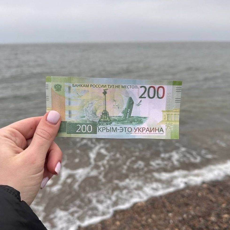 A counterfeit ruble bill issued by Ukrainian women's activist group, Zla Mavka.