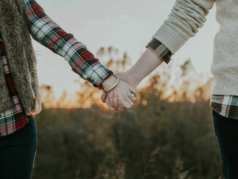 A couple holding hands