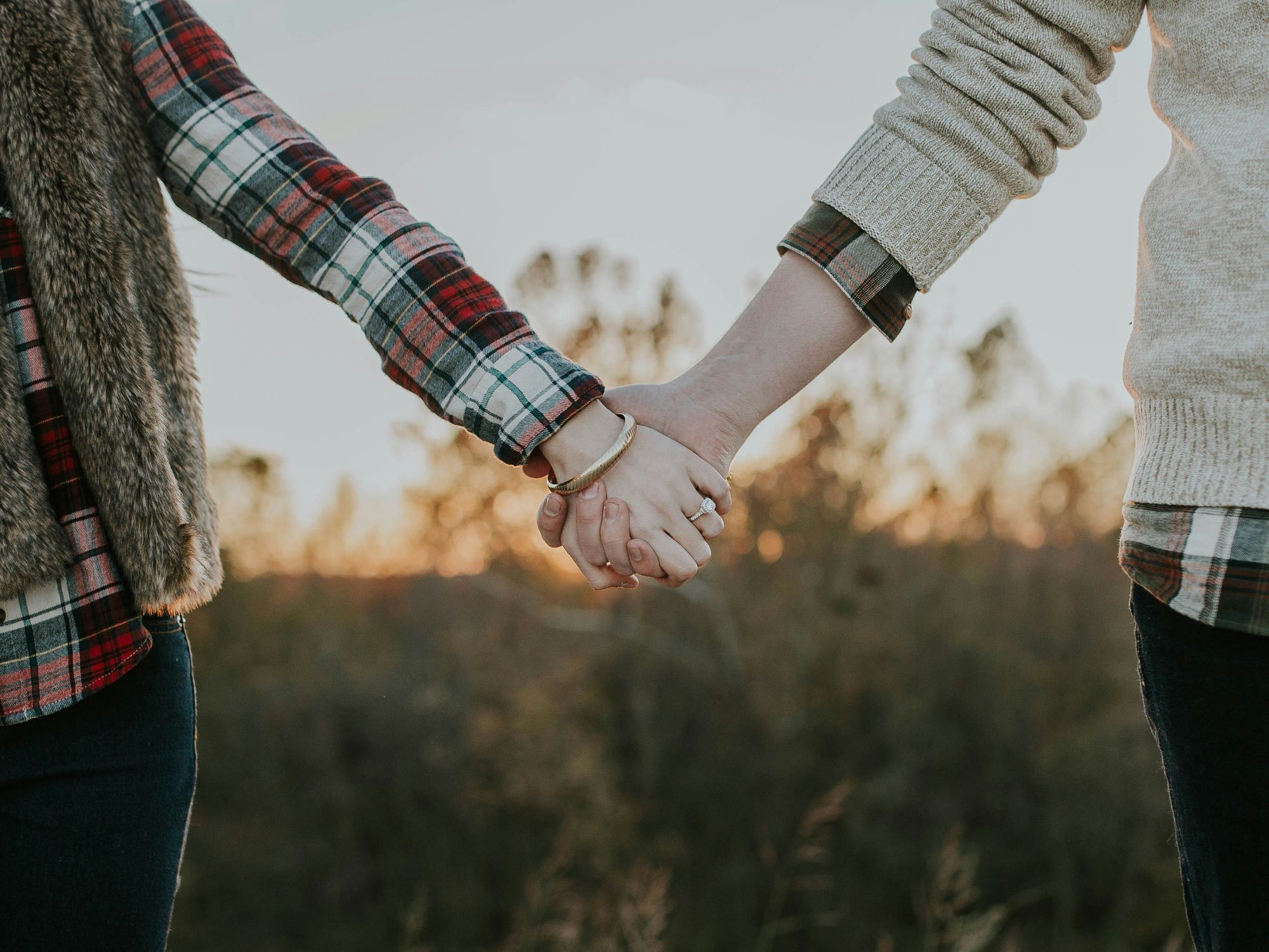 A couple holding hands