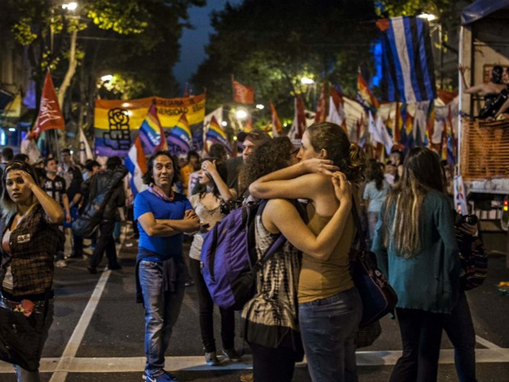 A couple kissing during the Buenos Aires LBGTIQ Pride Parade in 2013