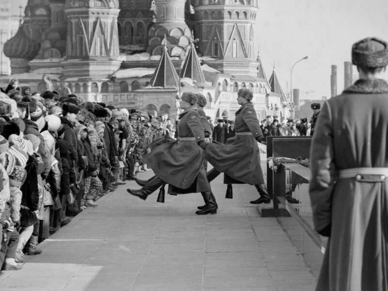 A crowd watches the hourly changing of the honor guard at Lenin's mausoleum in Red Square