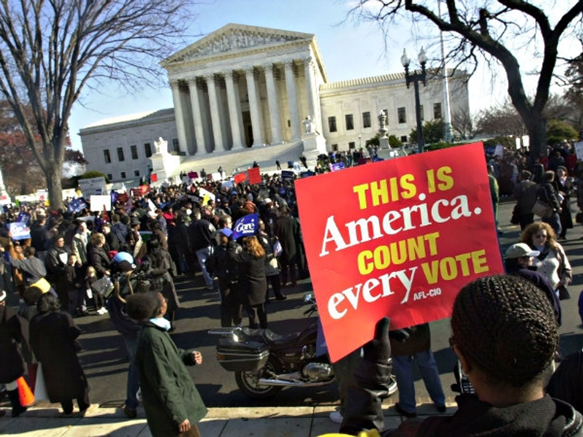 A December 2000 file photo shows Supreme Court protests before Bush v. Gore decision.
