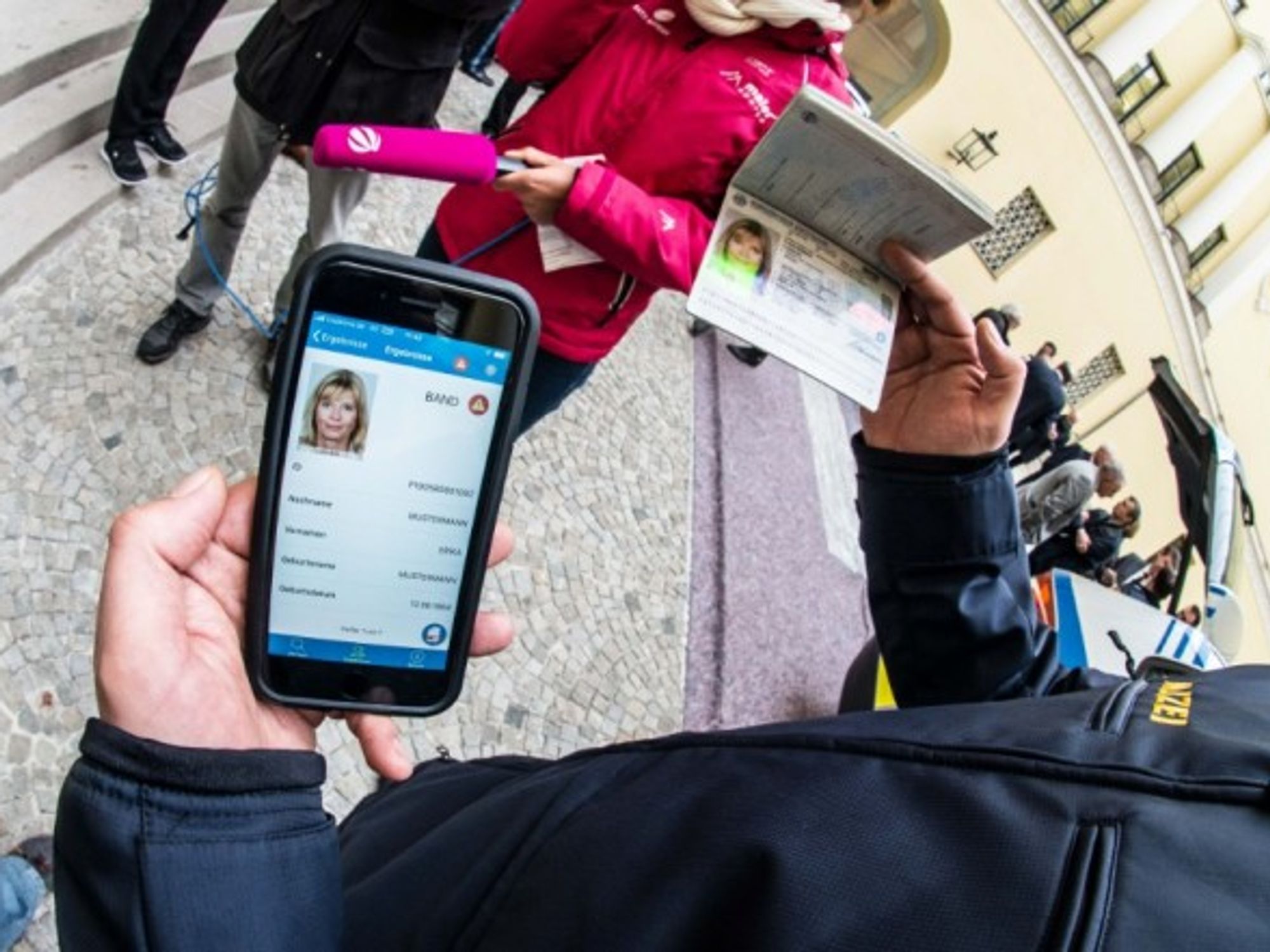 A demonstration of the use of smartphones to verify passports in Munich in May 2018