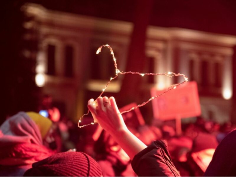 A demonstrator rises a cloth hander during a pro-choice protest in Warsaw