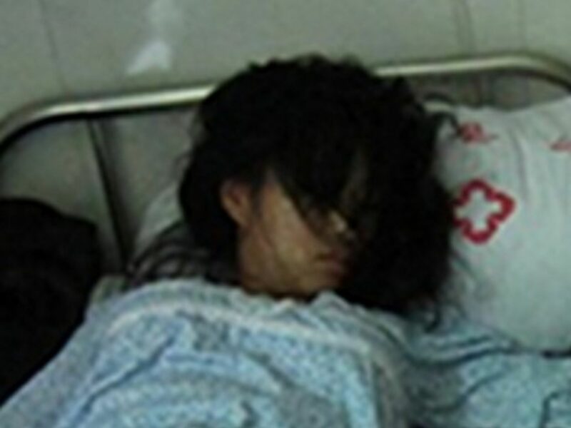 A detail of the photo of Feng Jianmei alongside her aborted fetus