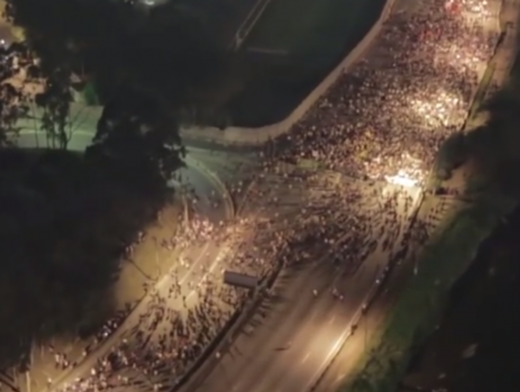 A drone captures Brazilian demonstrators massing below