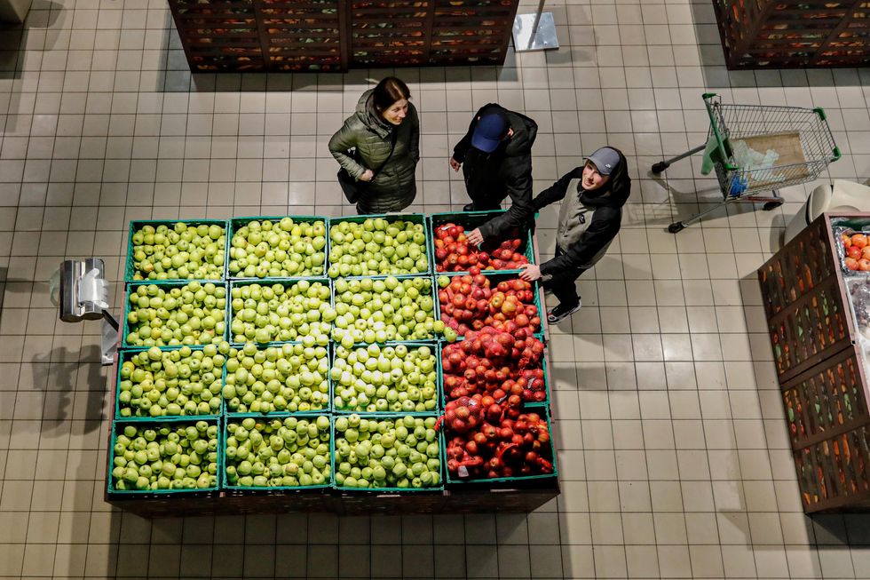 A family in a supermarket in downtown Kyiv