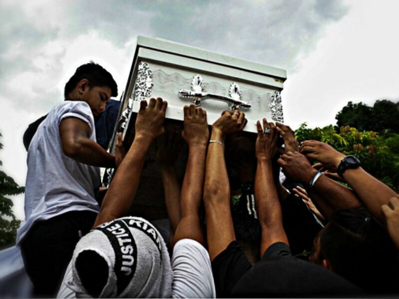 A funeral earlier this year for a teenager killed by police in Manila .