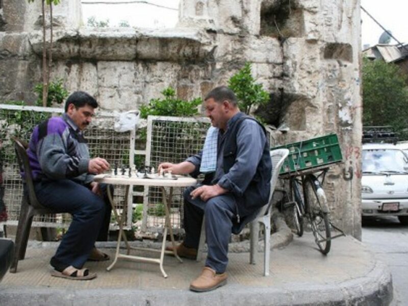 A game of chess near the Roman ruins of Temple of Jupiter in Damascus