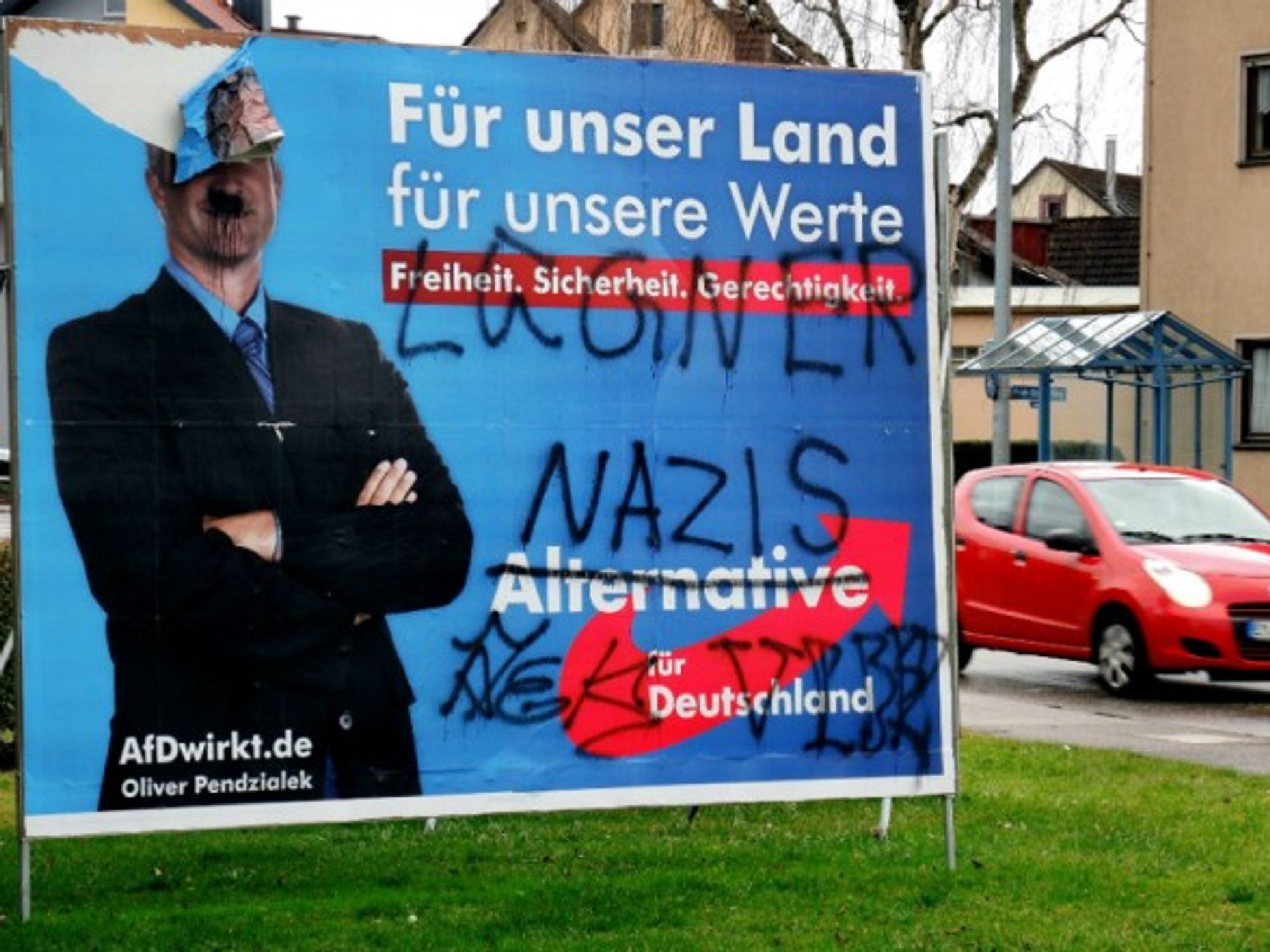 A graffitied AfD poster