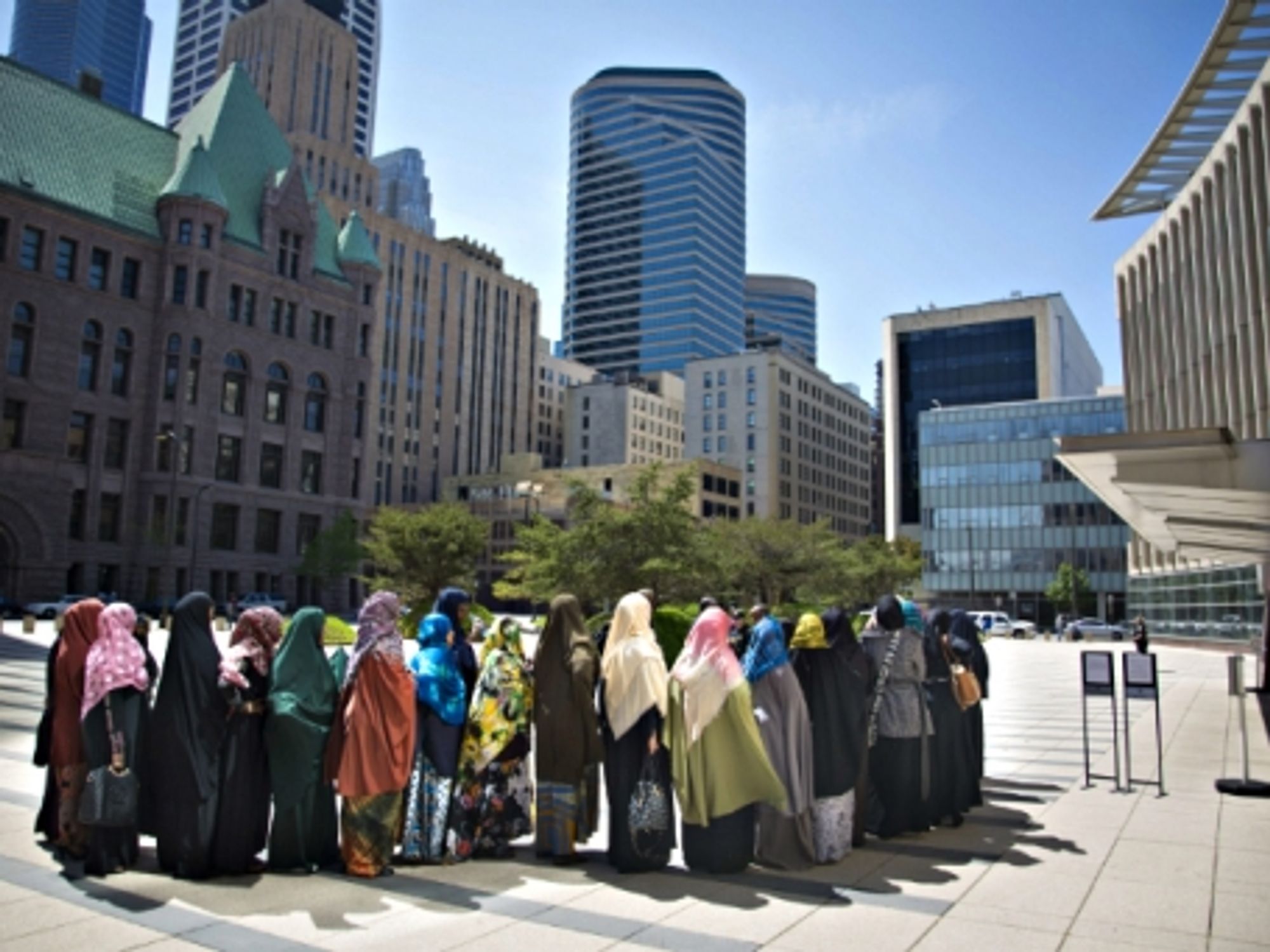 A group of Somali women wait outside Minneapolis' Federal Courthouse