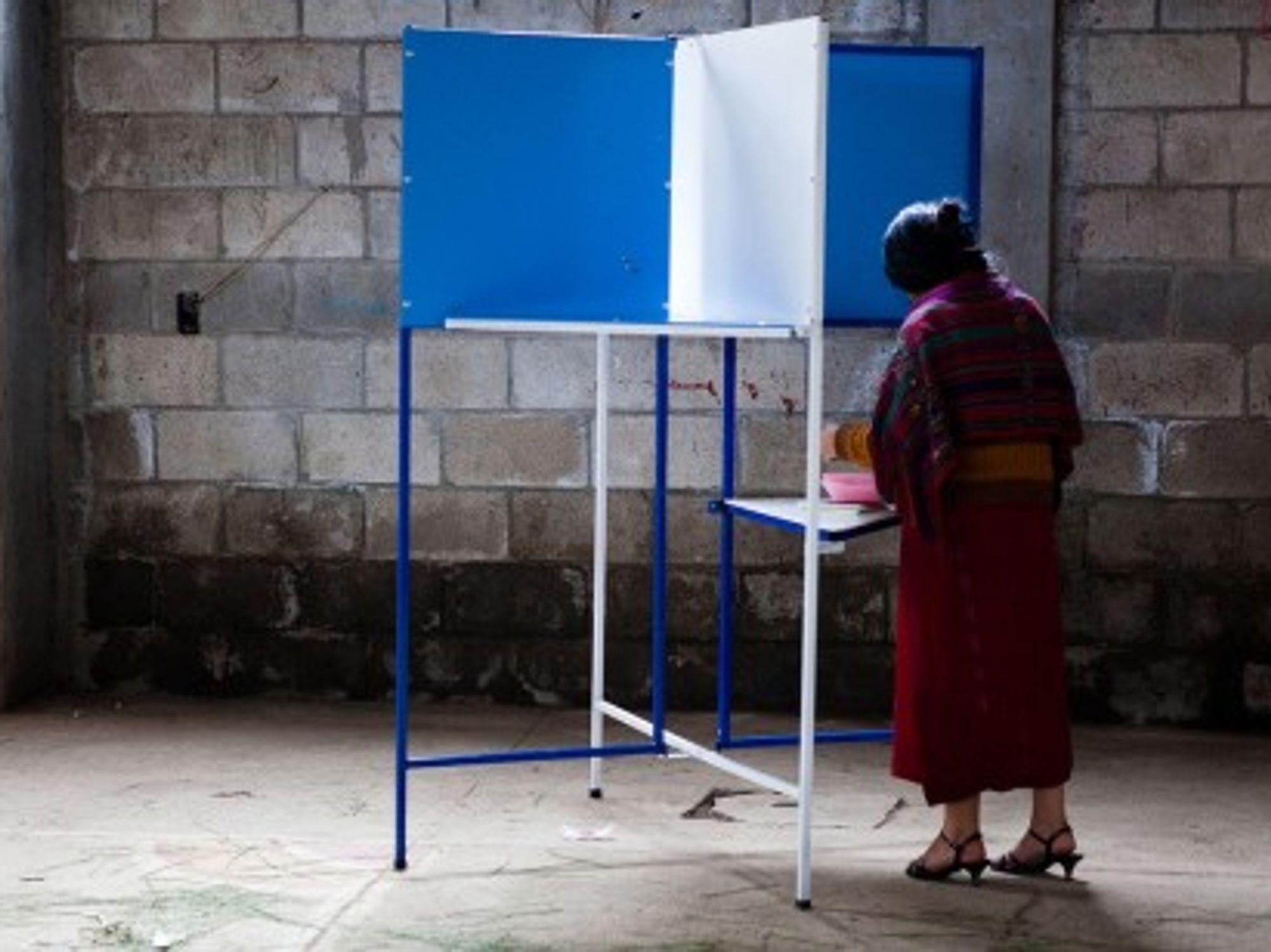 A Guatemalan woman votes in September's first-round election