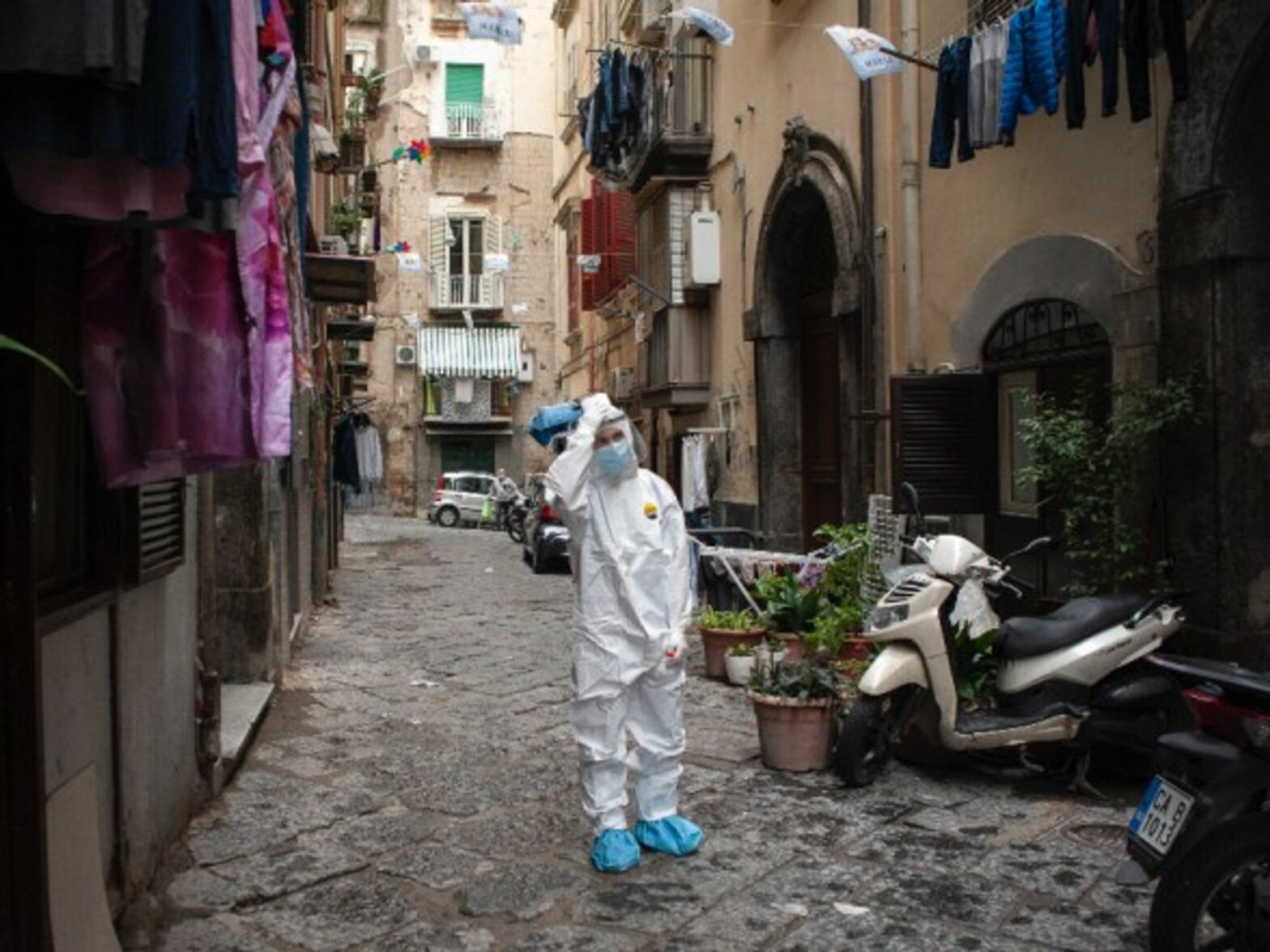A healthcare worker collecting swab samples in Naples