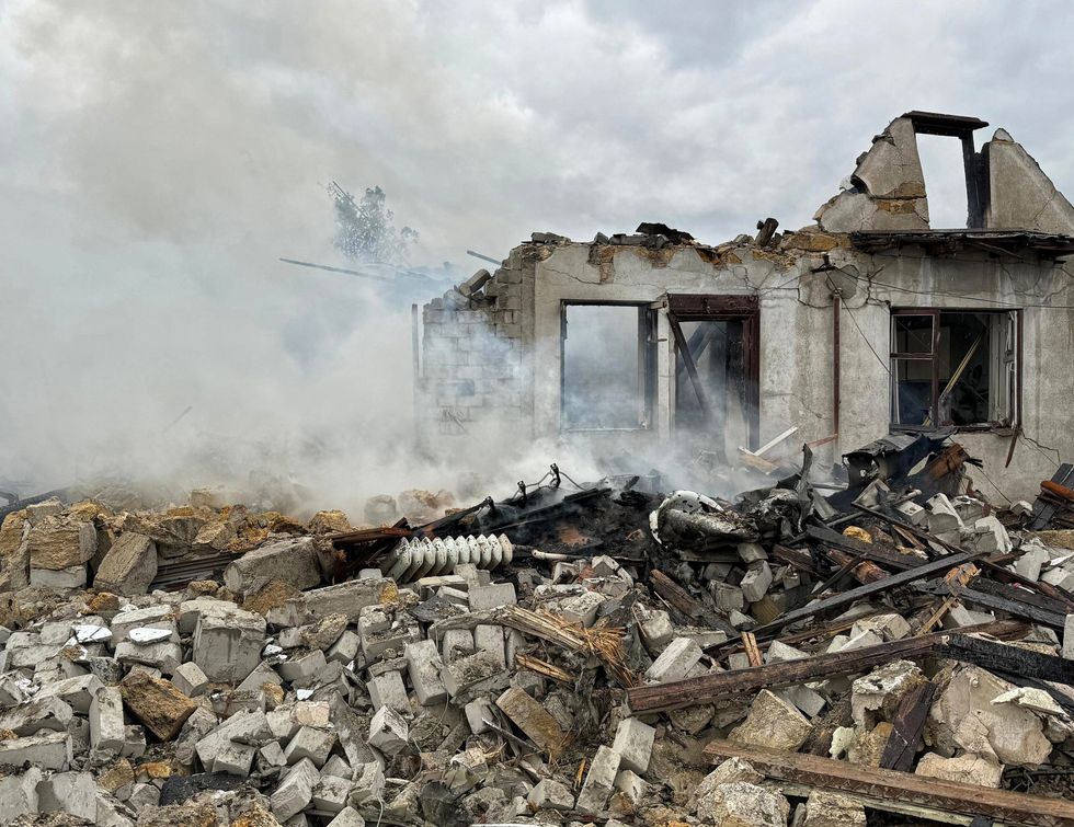 A house is damaged by the falling debris of a Russian rocket in Odesa.