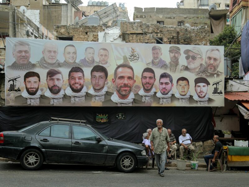 A large poster with the faces pro-Iranian Hezbollah fighters.